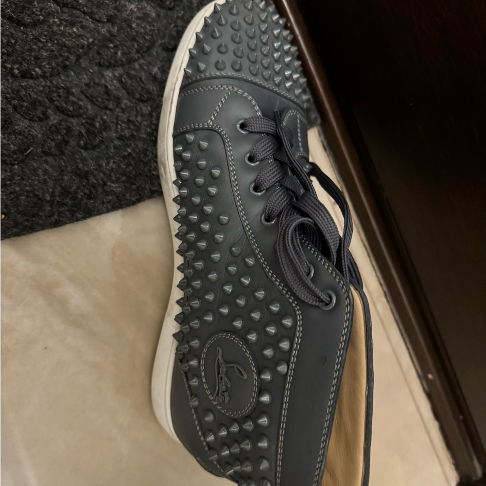 Christian Louboutin men’s gray boots with spikes ￼